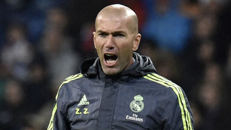 Real Madrid's French coach Zinedine Zidane shouts from the sideline during the Spanish league football match Real Madrid CF vs RC Deportivo La Coruna at the Santiago Bernabeu stadium in Madrid on January 9, 2016.  AFP PHOTO / GERARD JULIEN / AFP / GERARD JULIEN        (Photo credit should read GERARD JULIEN/AFP/Getty Images)