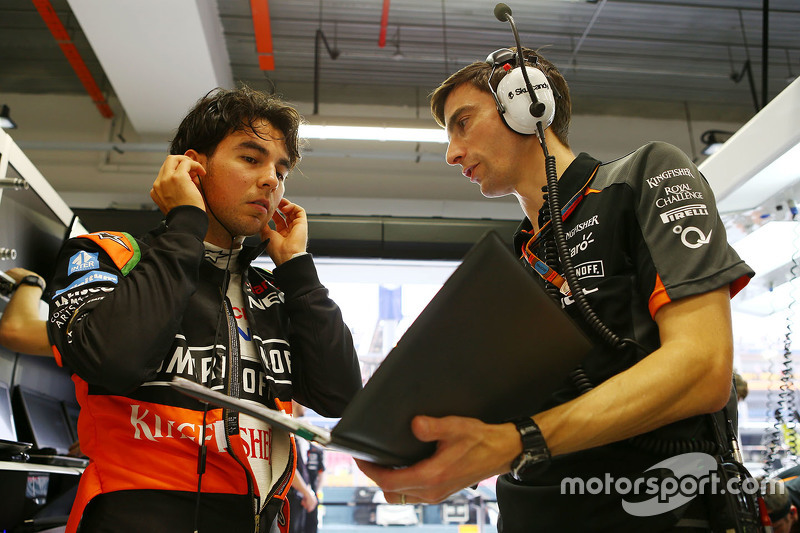 (L to R): Sergio Perez (MEX) Sahara Force India F1 with Tim Wright (GBR) Sahara Force India F1 Team Race Engineer. 18.09.2015. Formula 1 World Championship, Rd 13, Singapore Grand Prix, Singapore, Singapore, Practice Day. - www.xpbimages.com, EMail: requests@xpbimages.com - copy of publication required for printed pictures. Every used picture is fee-liable. © Copyright: Batchelor / XPB Images